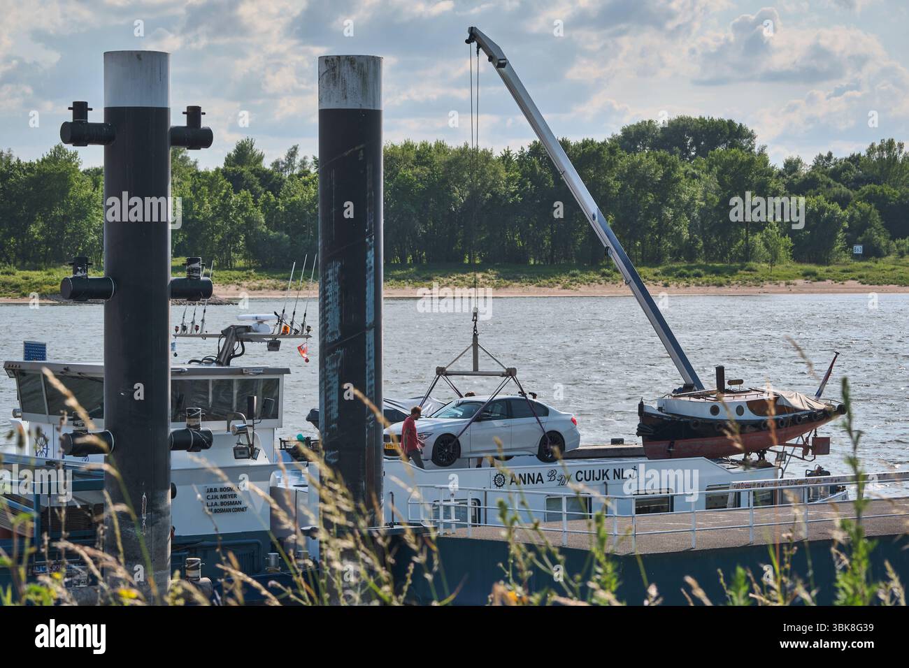 June 2, 2025 - Tolkamer‑Netherlands: A inland cargo vessel unloads a ...