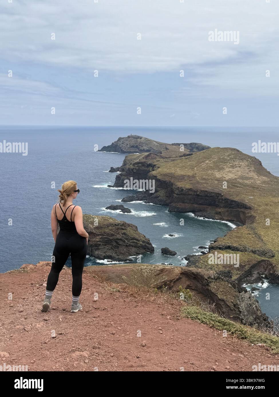 Picturesque view of the rocky coast of Madeira, Portugal. A seascape with white waves and rugged rocks. Travel concept - Smartphone Captured Stock Image