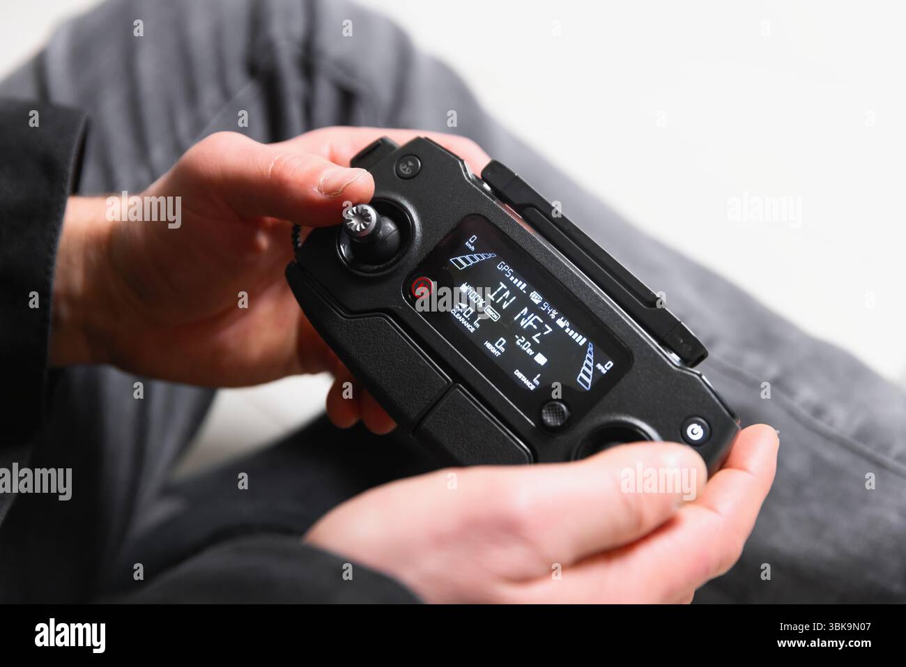 No flight zone displaying on drone controller closeup Stock Photo