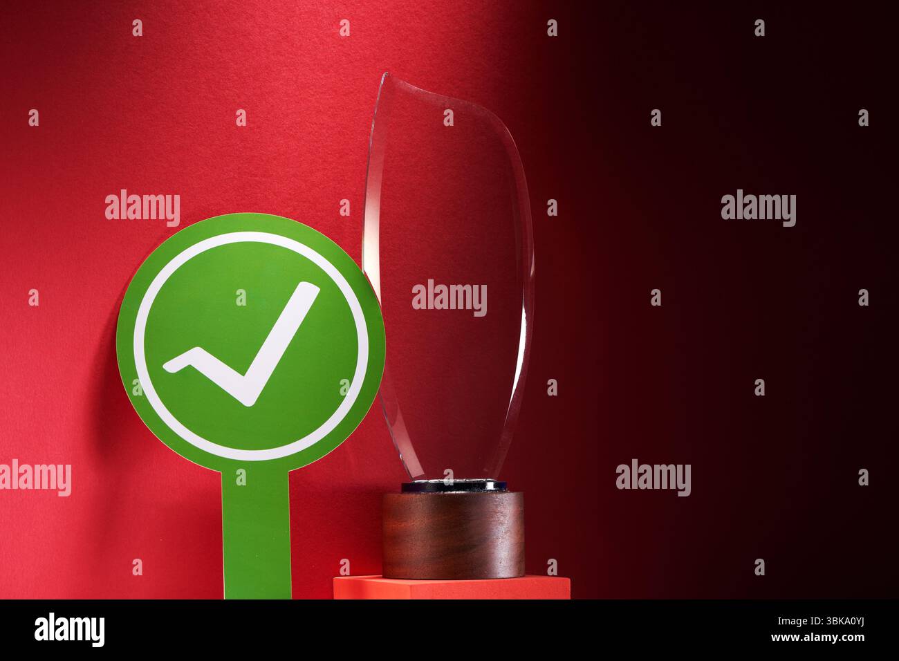 green circle with check mark and crystal trophy Stock Photo - Alamy