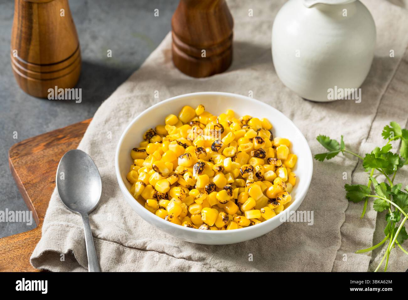 Homemade Fire Roasted Corn Kernels in a Bowl Stock Photo