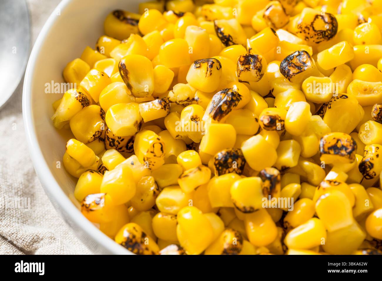 Homemade Fire Roasted Corn Kernels in a Bowl Stock Photo