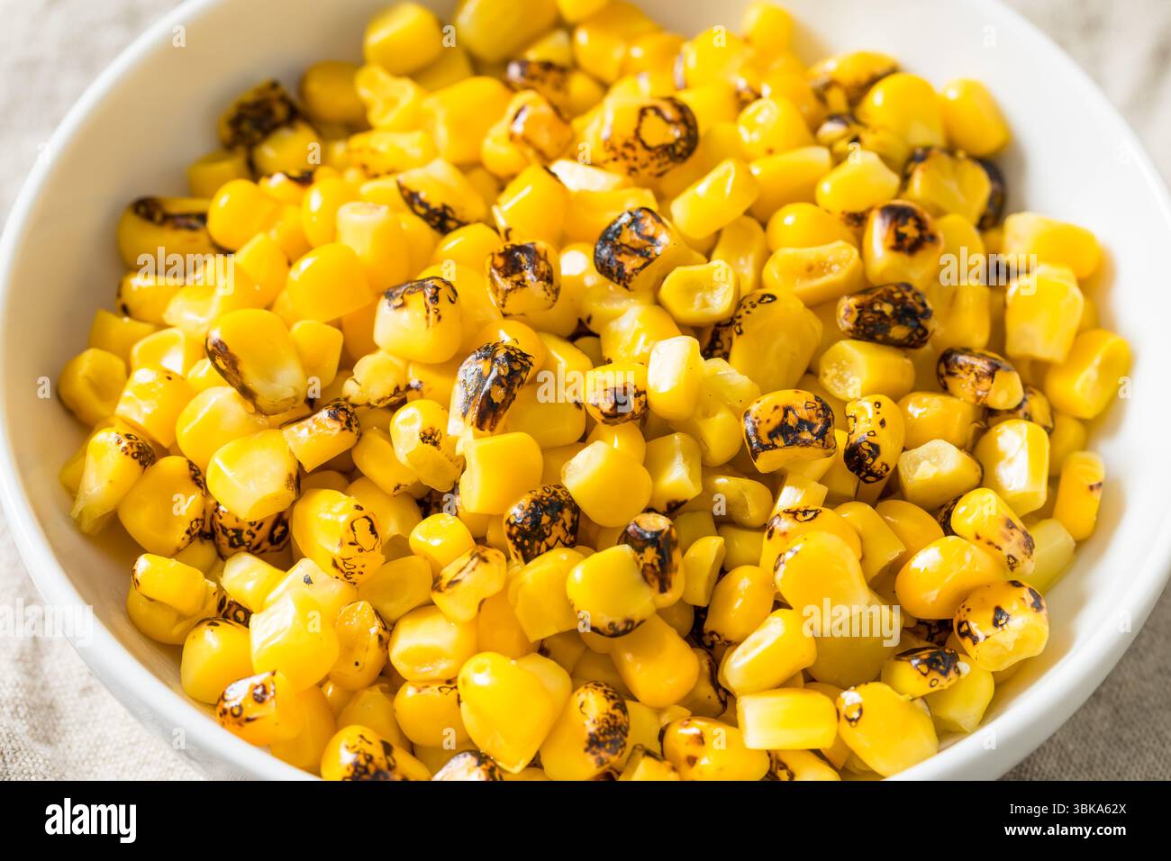 Homemade Fire Roasted Corn Kernels in a Bowl Stock Photo