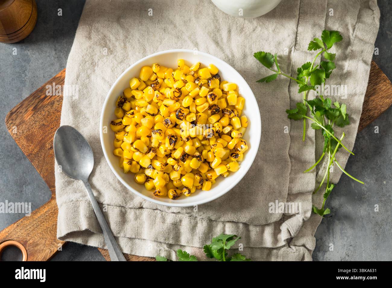 Homemade Fire Roasted Corn Kernels in a Bowl Stock Photo
