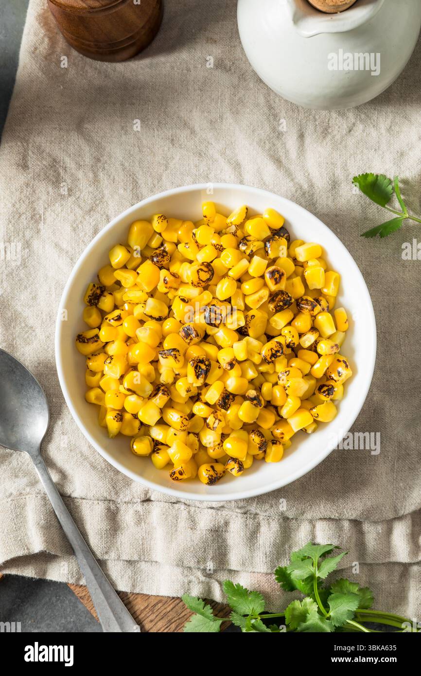 Homemade Fire Roasted Corn Kernels in a Bowl Stock Photo
