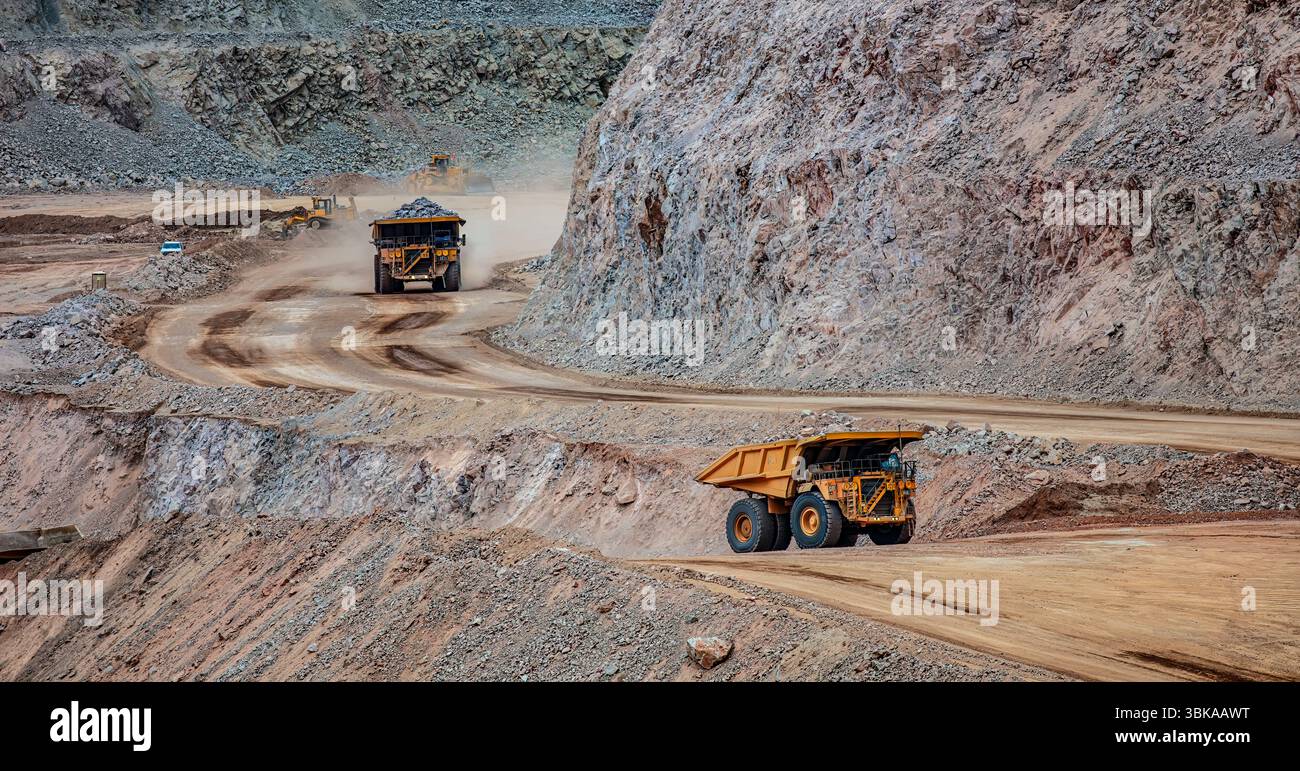 Haul Trucks Navigating Open-Pit Mine, Morenci Copper Mine, Arizona Stock Photo