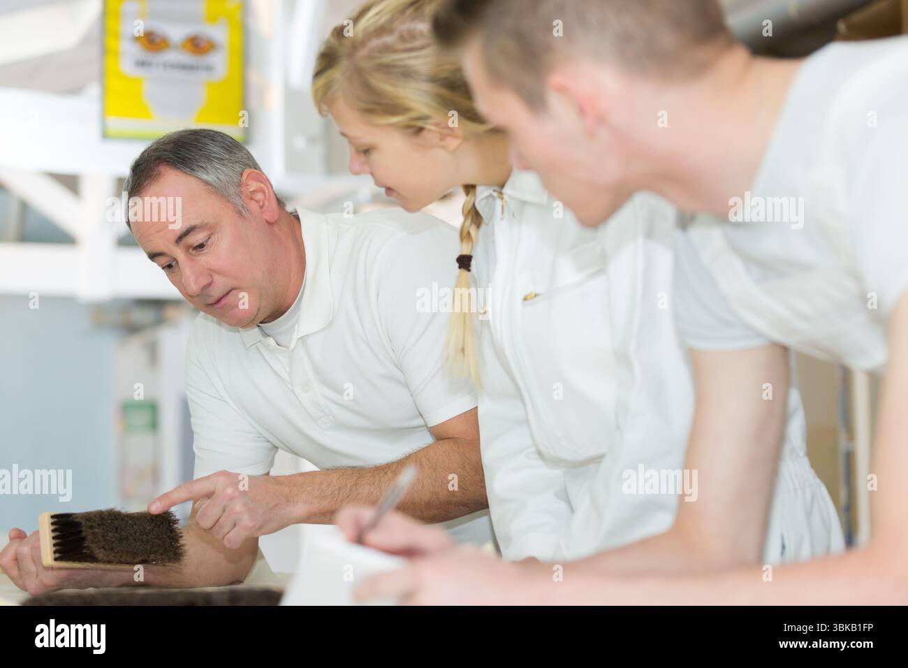 portrait of painter with apprentices Stock Photo