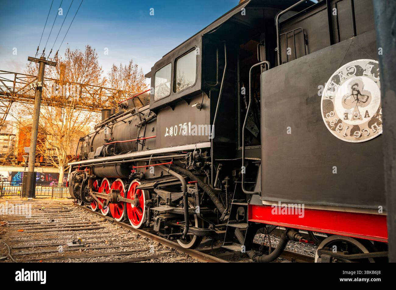 0751 steam locomotive outside ACE Cafe, Beijing China seen in winter Stock Photo