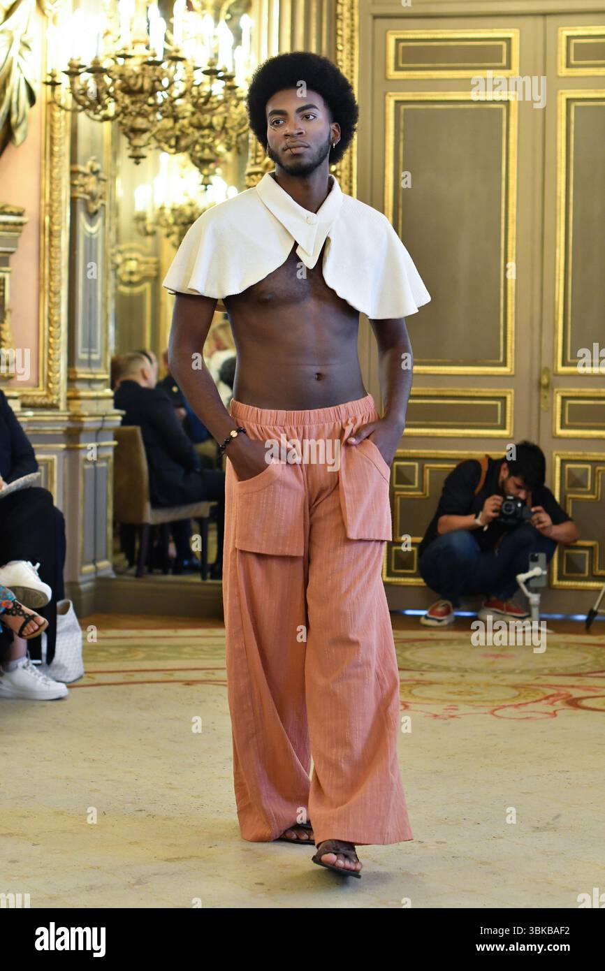 Mauricio Model Madrid, Spain. 19th June, 2025. A model walks the runway wearing a ...