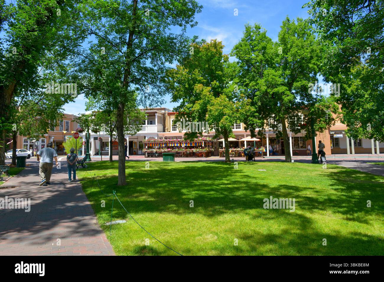 The Santa Fe Plaza in downtown Santa Fe, New Mexico in the style of ...