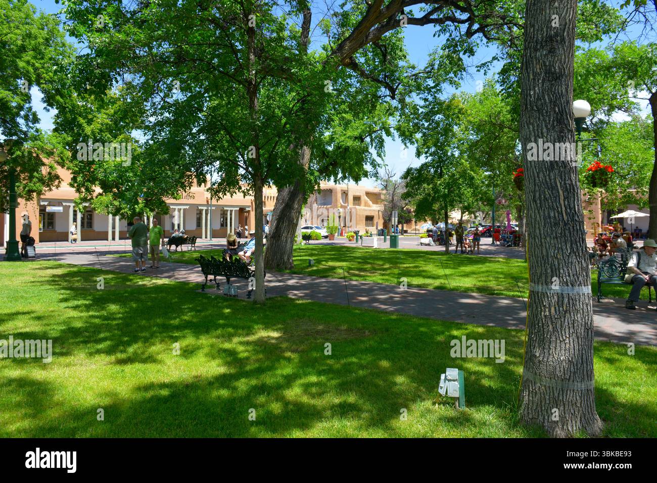 The Santa Fe Plaza in downtown Santa Fe, New Mexico in the style of ...
