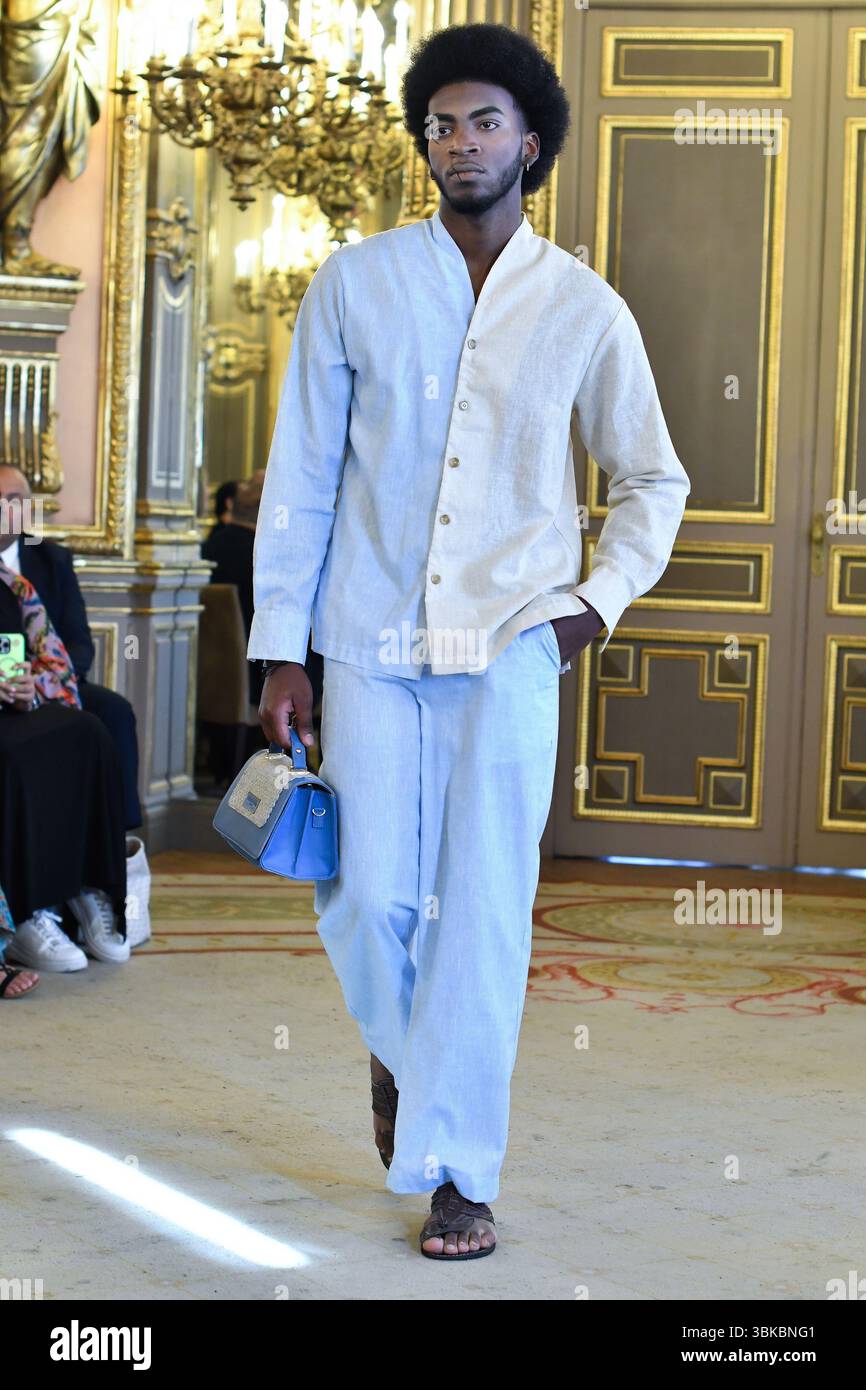Mauricio Model A model walks the runway wearing a Mauricio Figueroa design from the ...