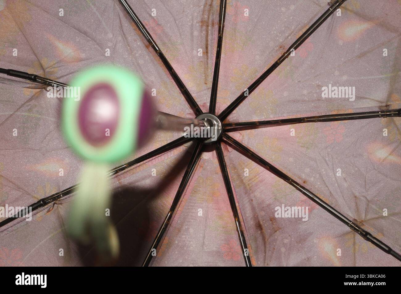 Umbrella Innerview The inside view of an umbrella, focusing on the central hub where the ...