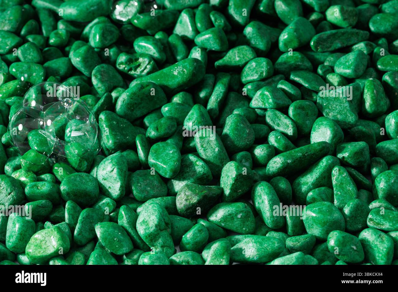 Green pebbles background. Green pebbles background texture. Stock Photo