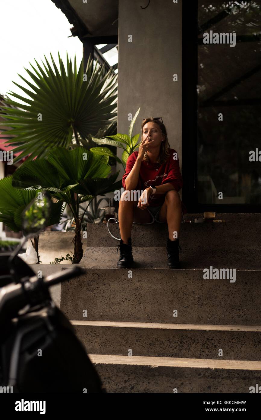 Woman in red sweater on hi-res stock photography and images - Alamy