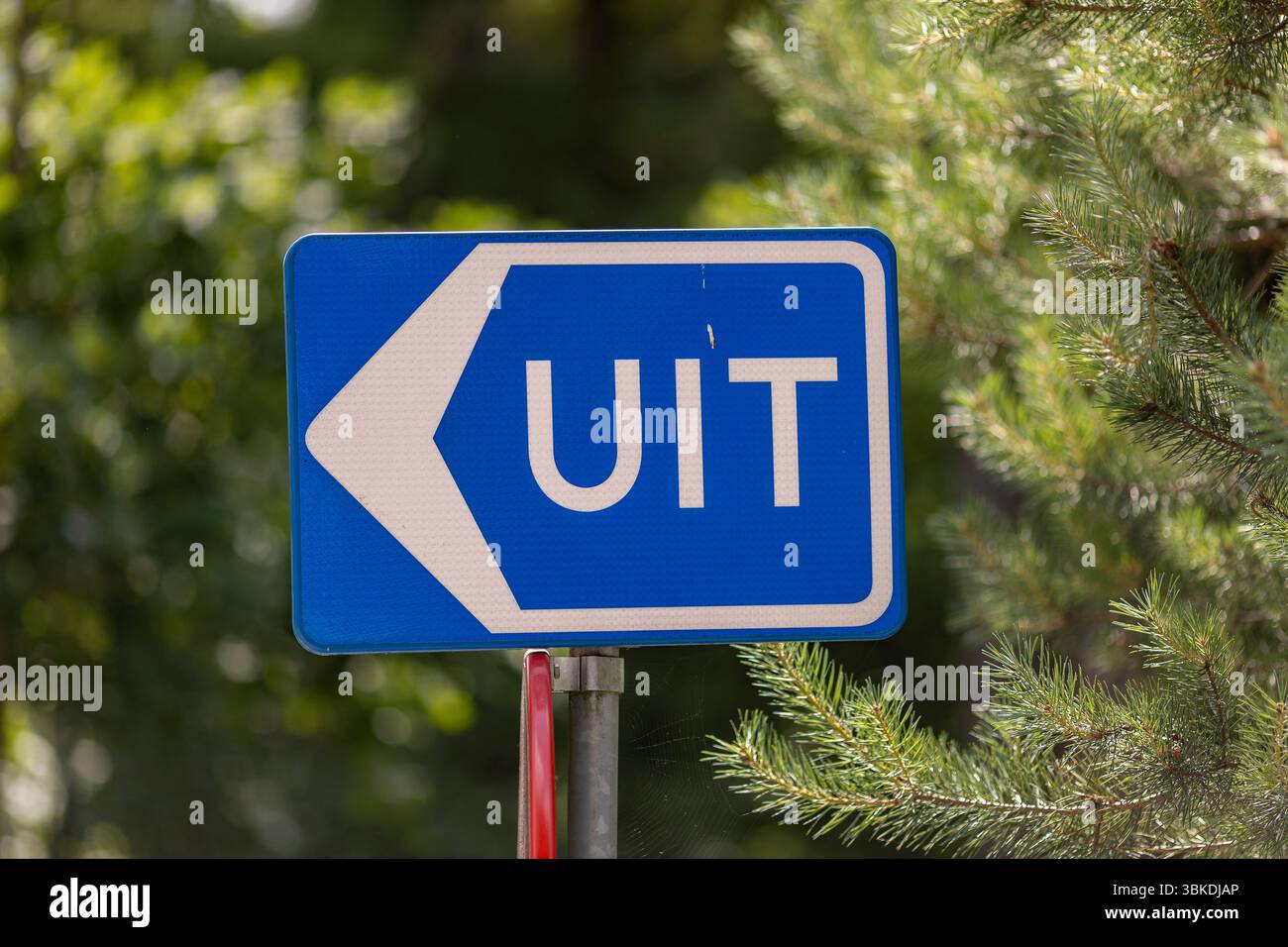 Dutch road and traffic sign with arrow and the word exit pointing ...