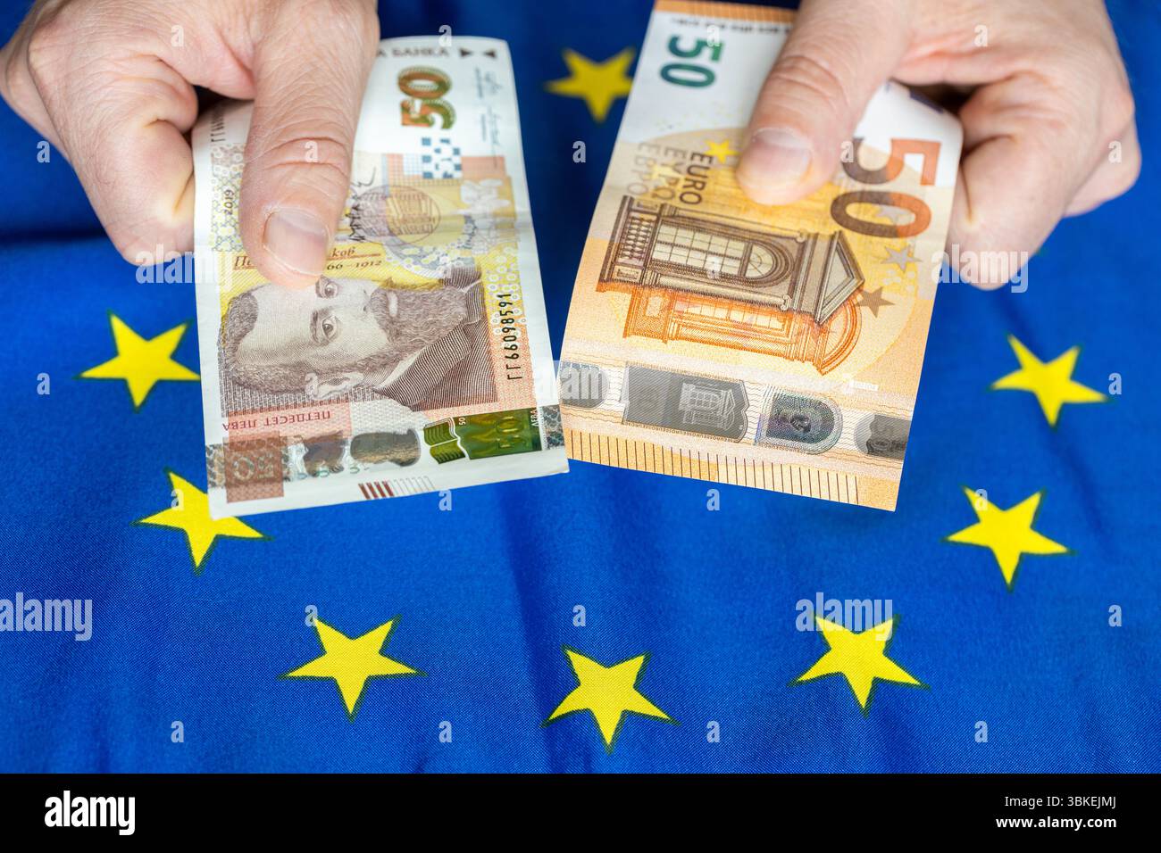 Bulgaria euro. Business and financial concept. 50 Bulgarian leva and a 50  euro bill in the other hand against the backdrop of the European Union flag  Stock Photo - Alamy