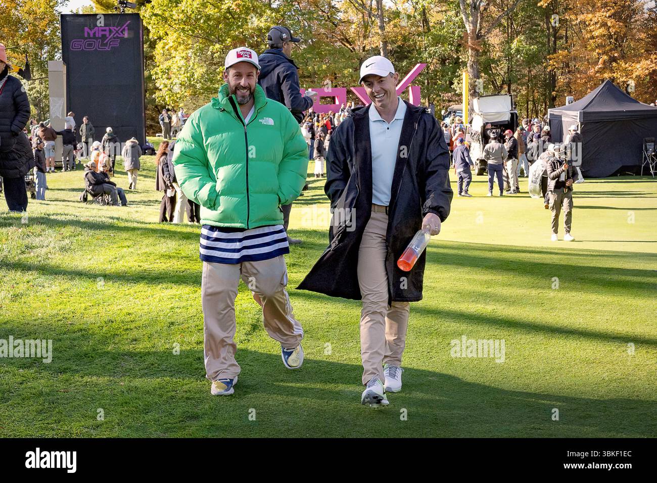 RELEASE DATE: July 25, 2025. TITLE: Happy Gilmore 2. STUDIO: Netflix. DIRECTOR: Kyle Newacheck. PLOT: Continuing Happy Gilmore series. STARRING: ADAM SANDLER as Happy Gilmore, RORY MCILROY as himself on the set. (Credit Image: © Netflix/Entertainment Pictures/ZUMAPRESS.com) EDITORIAL USAGE ONLY! Not for Commercial USAGE! Stock Photo