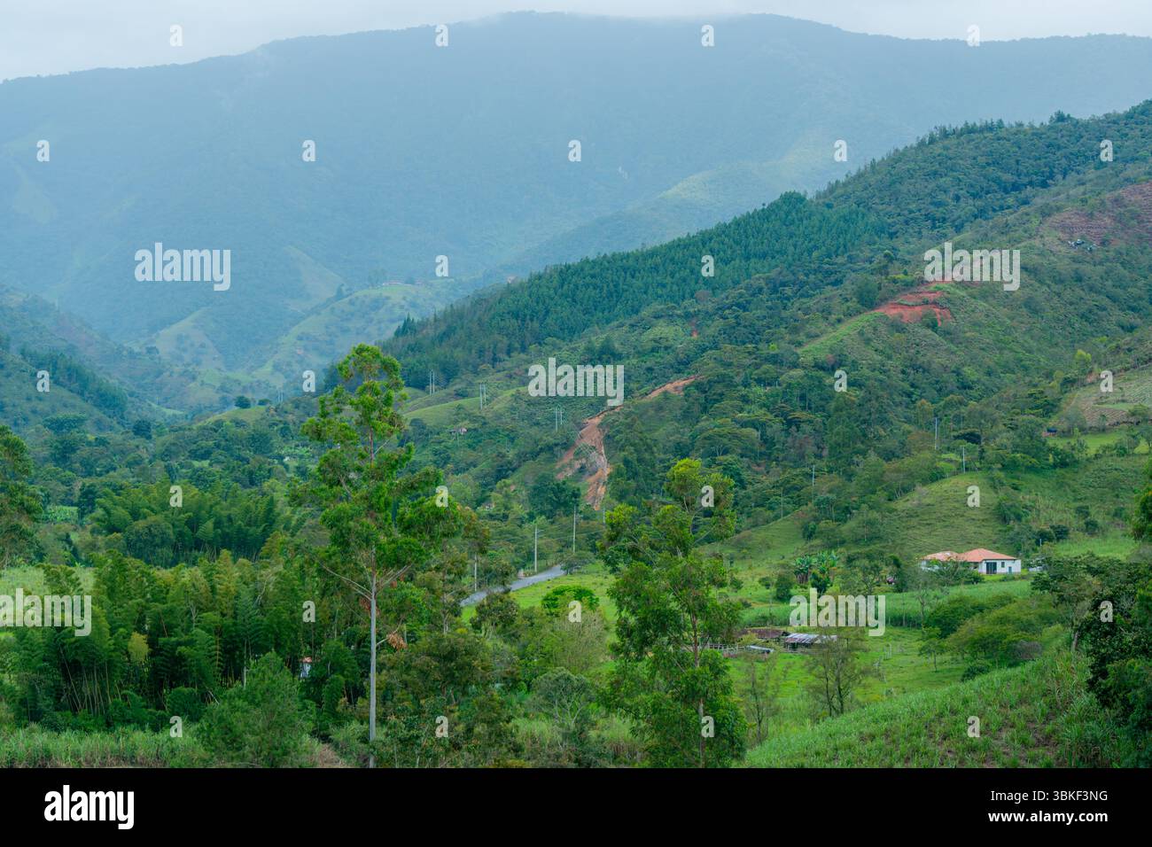 Scenic view of a Colombian mountain landscape featuring a rural house ...
