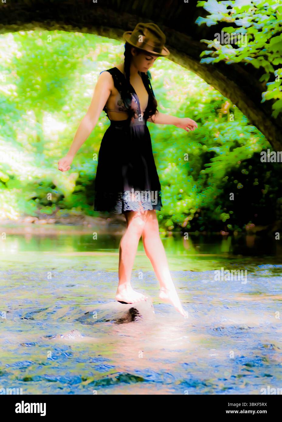 Woman in flowing dress standing hi-res stock photography and images - Alamy