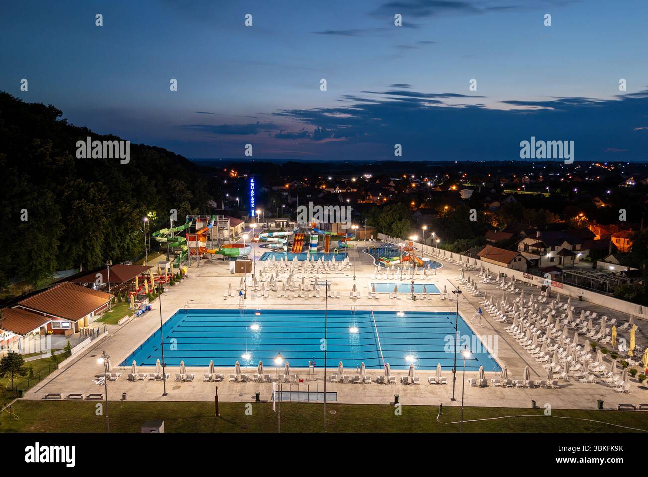 Ub, Serbia - July 22, 2024: Aerial view of the aqua park on a summer night in the town of Ub in Serbia. Stock Photo