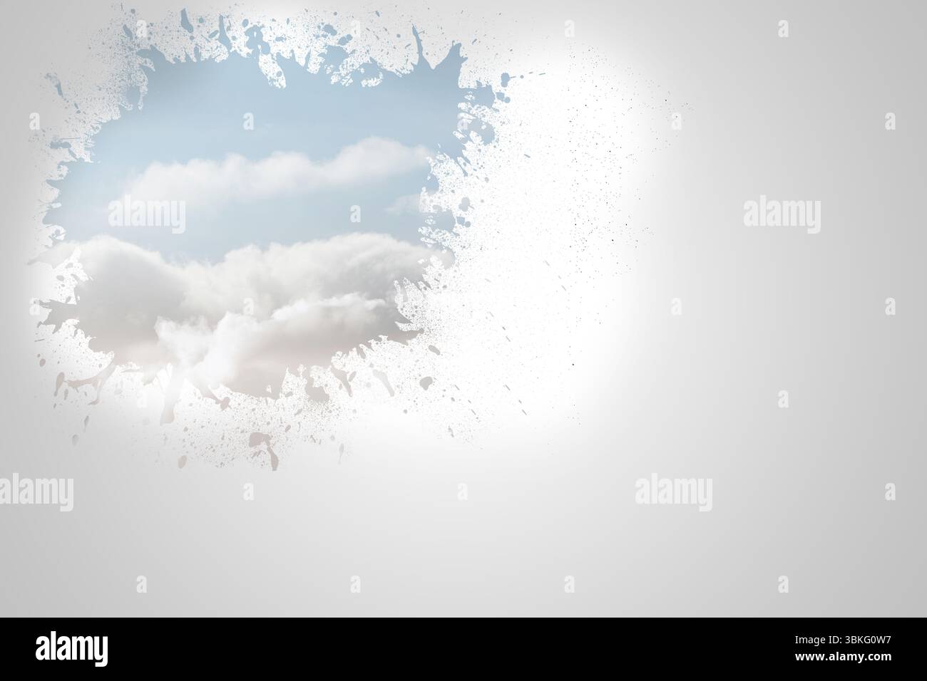 Splash on wall revealing clouds Stock Photo