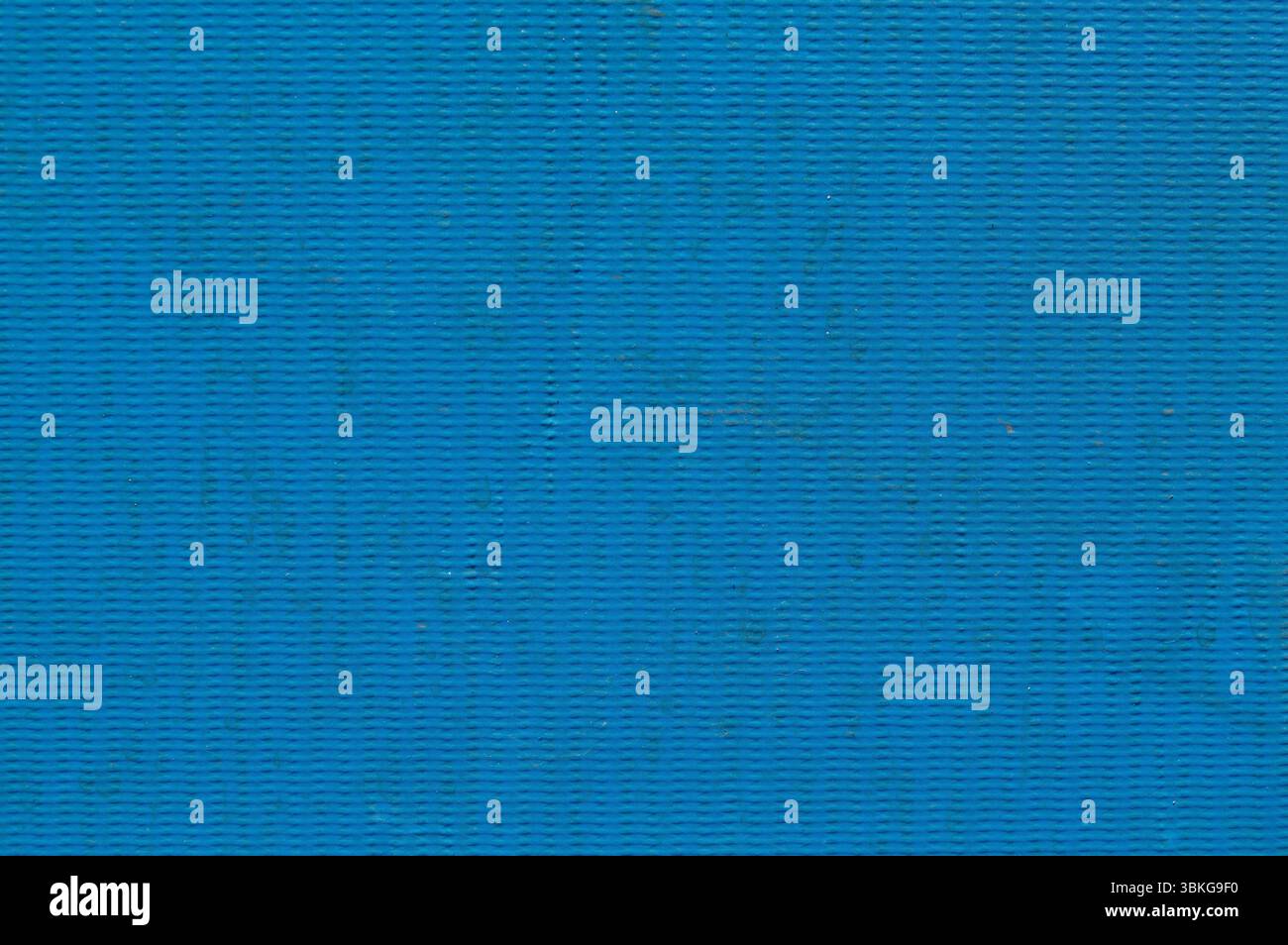 Blue textured rubber surface background close-up full frame. Stock Photo