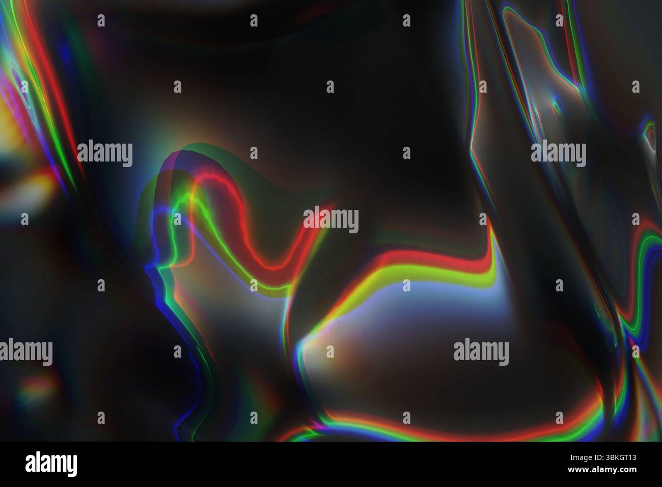 flowing multicolor light patterns over a dark, liquid-like background Stock Photo
