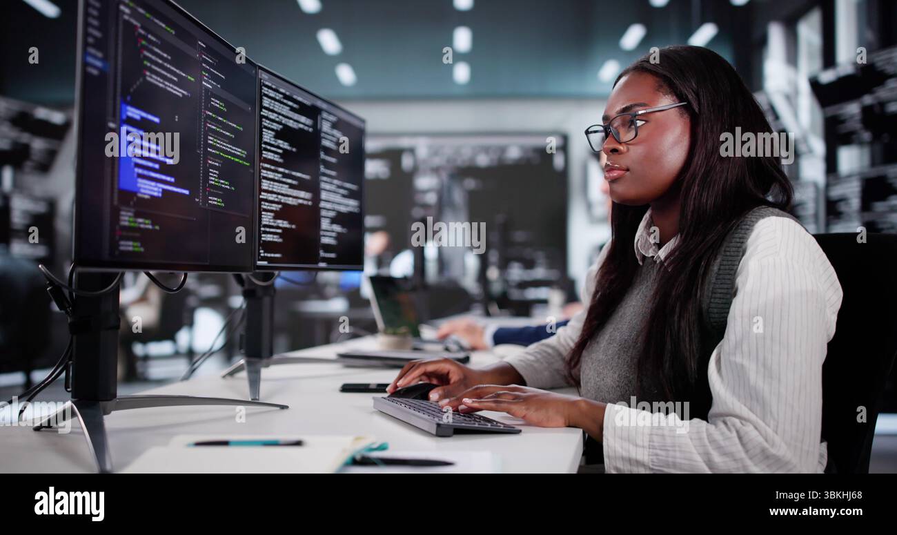Innovative Tech Team Collaborating To Engineer Computer Solutions For Business. Stock Photo