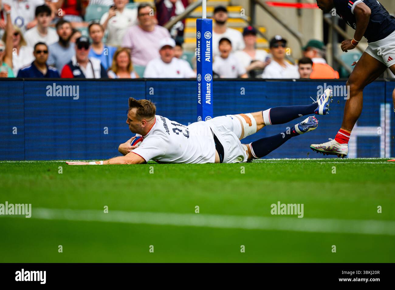 LONDON, UNITED KINGDOM. June 21: Alex Dombrandt of England scores a try ...