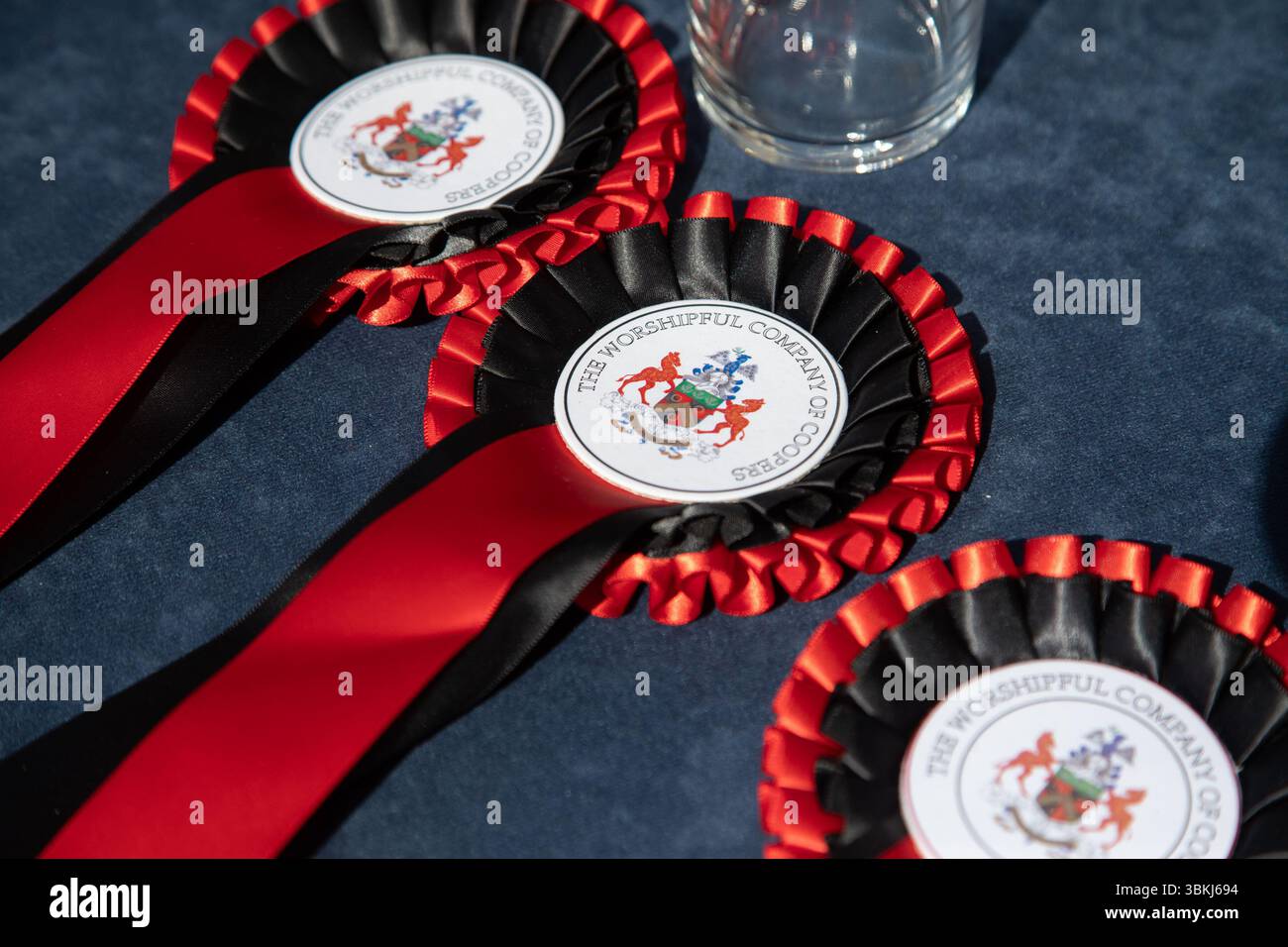 London, England, UK. 21st June 2025. The Worshipful Company of Coopers hosted the fourth annual Coopers’ Cask Race in Guildhall Yard, where 26 teams, including livery companies, schools, uniformed services, and Yeoman Warders, competed in a lively barrel-rolling celebration. Credit:Kiki Streitberger/Alamy Live News Stock Photo