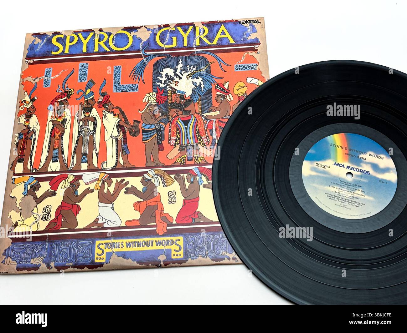 Vintage vinyl record of Stories Without Words by Spyro Gyra. Jazz fusion album released on MCA Records featuring colorful Mayan-inspired cover art. Stock Photo