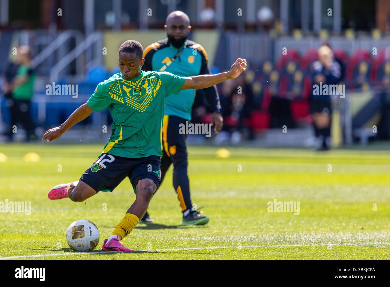 SAN JOSE, CA - JUNE 20: Dwayne Atkinson #12 of Jamaica warms up before ...