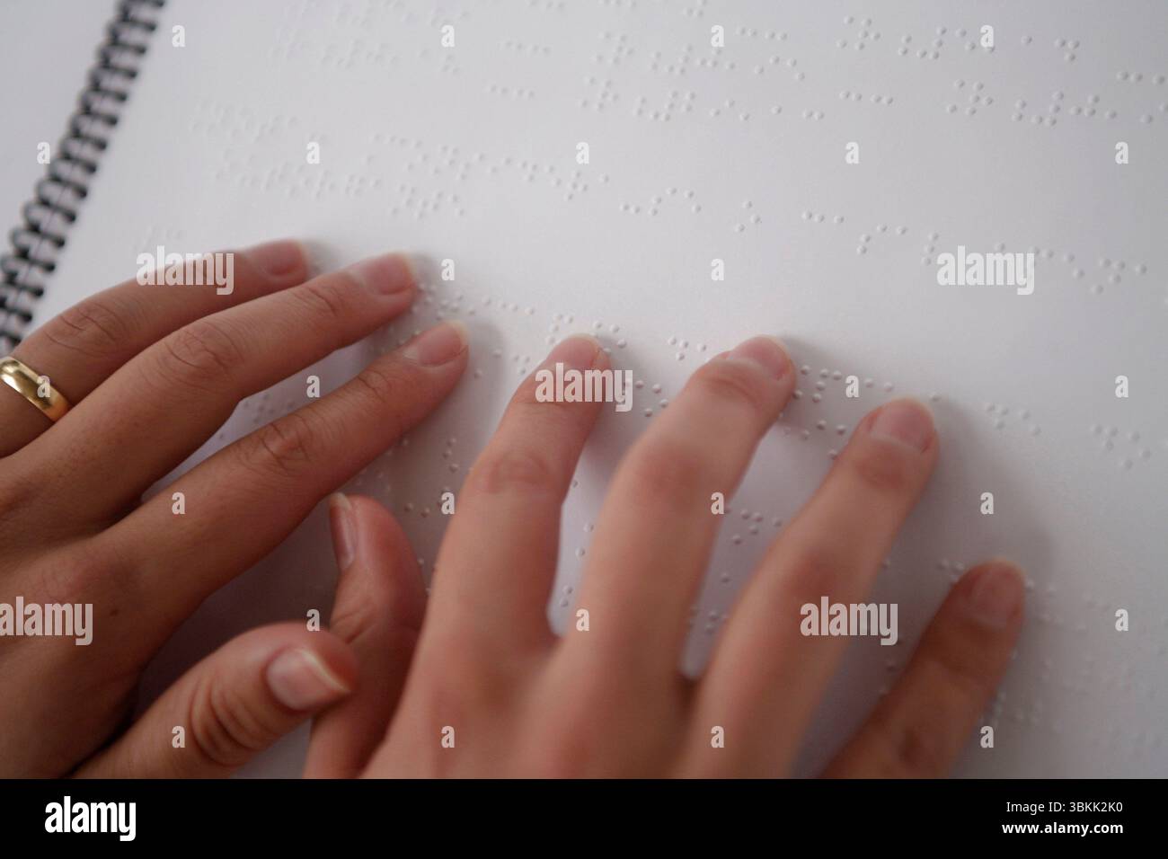 hands read the braille code Stock Photo - Alamy