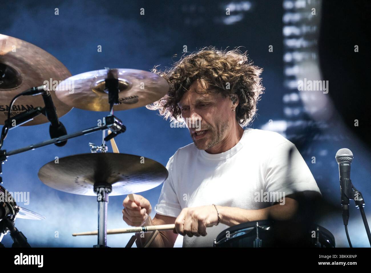 English drummer Adam Falkner, performing live on stage with The Script ...