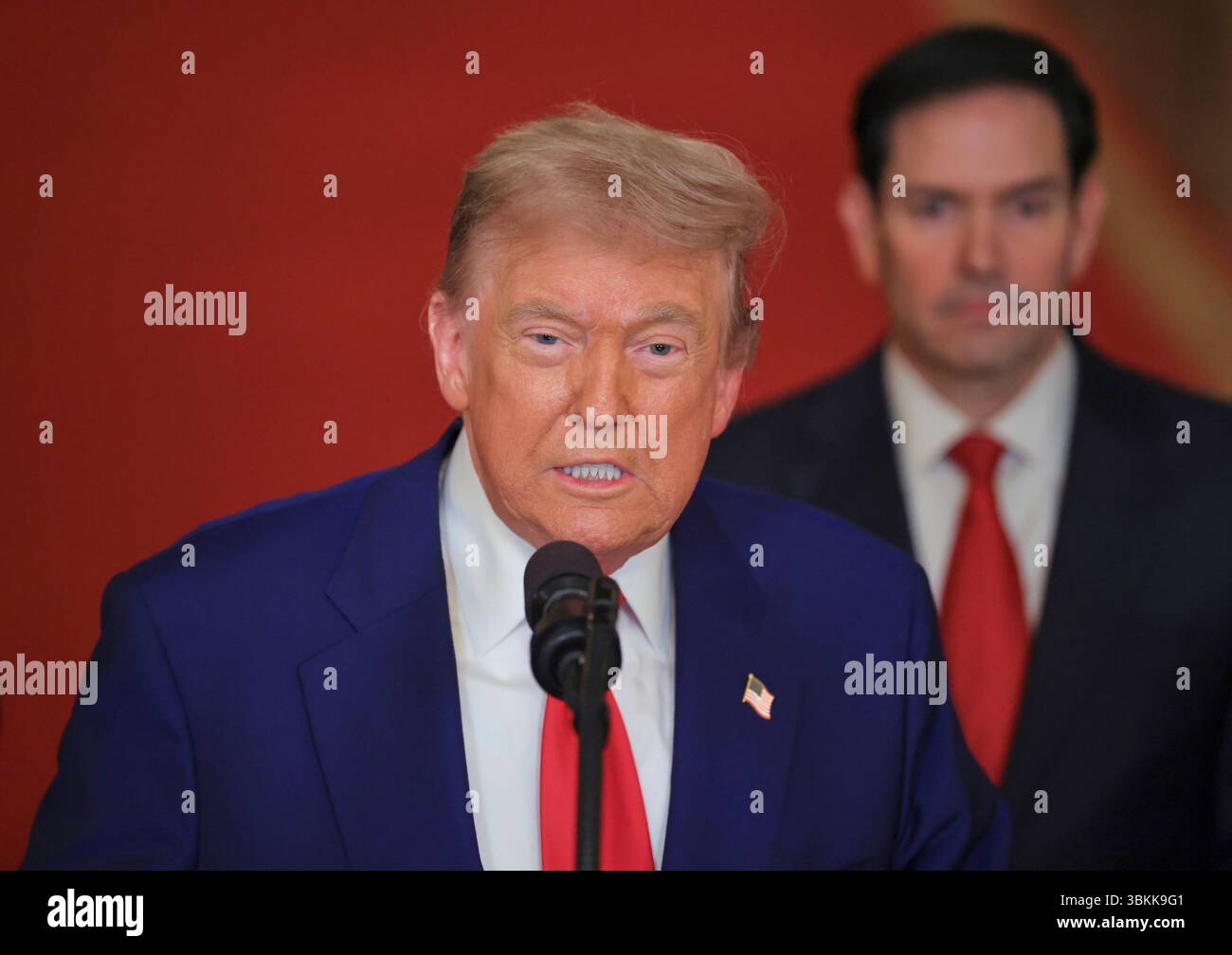 President Donald Trump speaks from the East Room of the White House in Washington, Saturday, June 21, 2025, after the U.S. military struck three Iranian nuclear and military sites, directly joining Israel's effort to decapitate the country's nuclear program, as Secretary of State Marco Rubio listens. (Carlos Barria/Pool via AP) Stock Photo