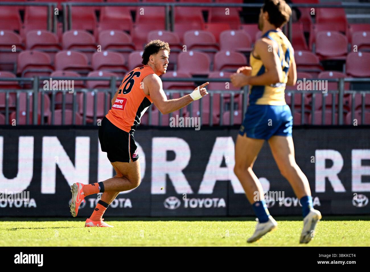 Jake Riccardi of the Giants celebrates after kicking a goal during the ...