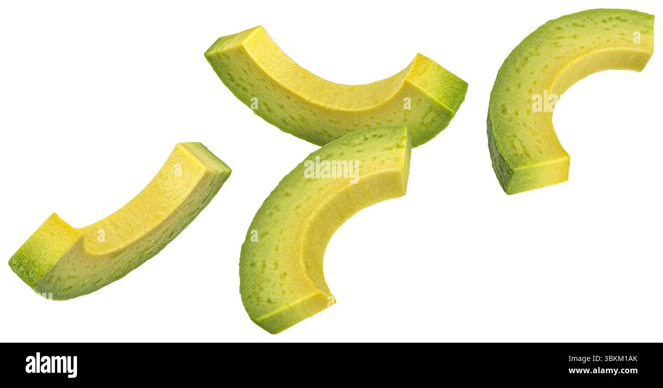 Falling avocado slices isolated on white background Stock Photo
