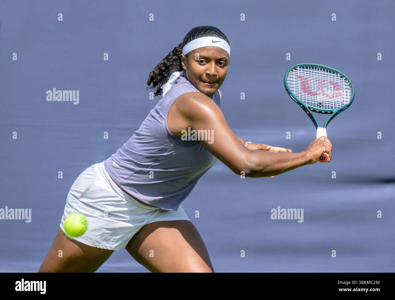 Hailey Baptiste (USA) playing in the first qualifying round for the Lexus Eastbourne Open, 21st June 2025 Stock Photo