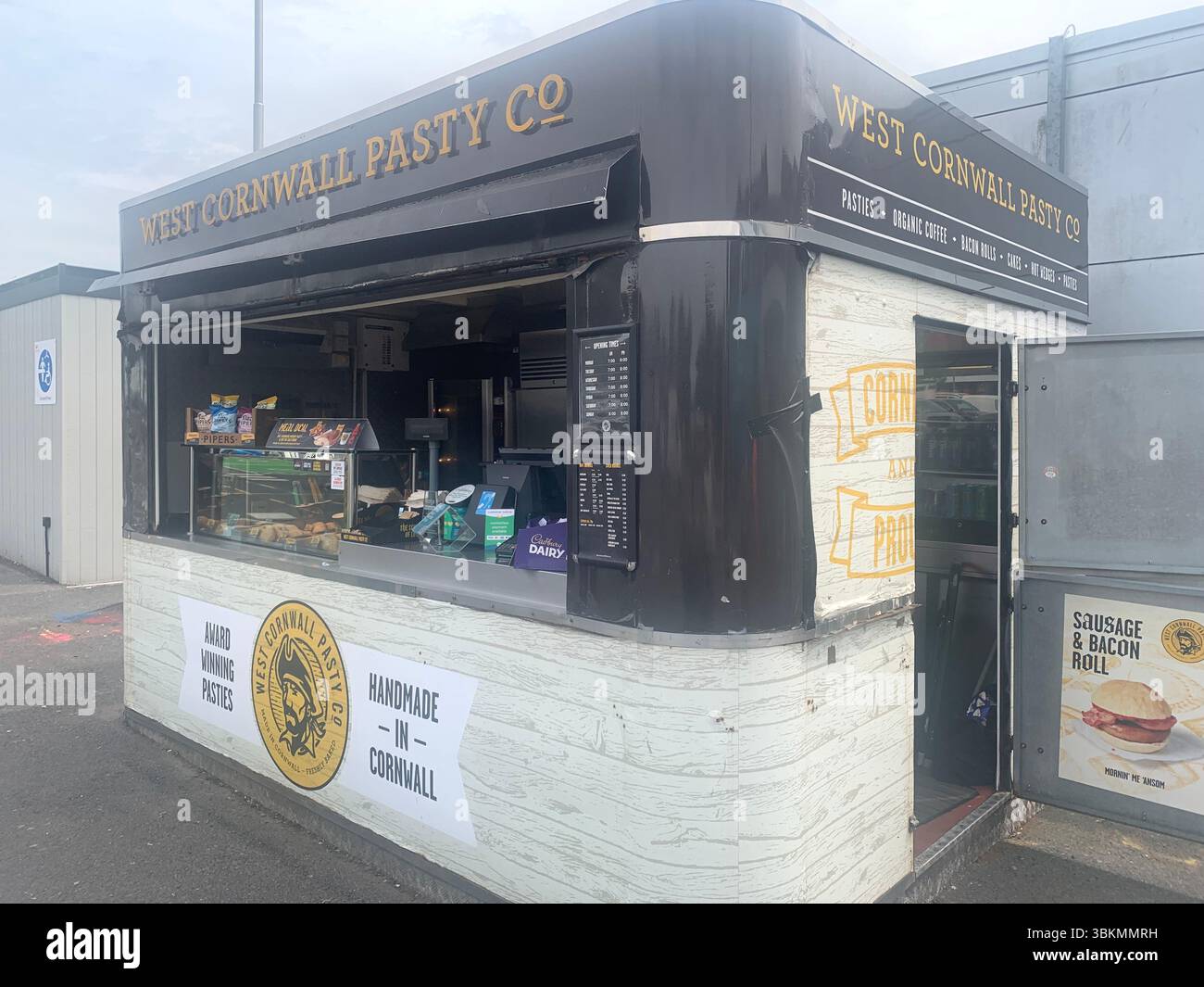 Moto Knutsford South Lake District UK fuel petrol electricity charging points point flowers food drink power services welcome arrive eating drinking - Smartphone Captured Stock Image