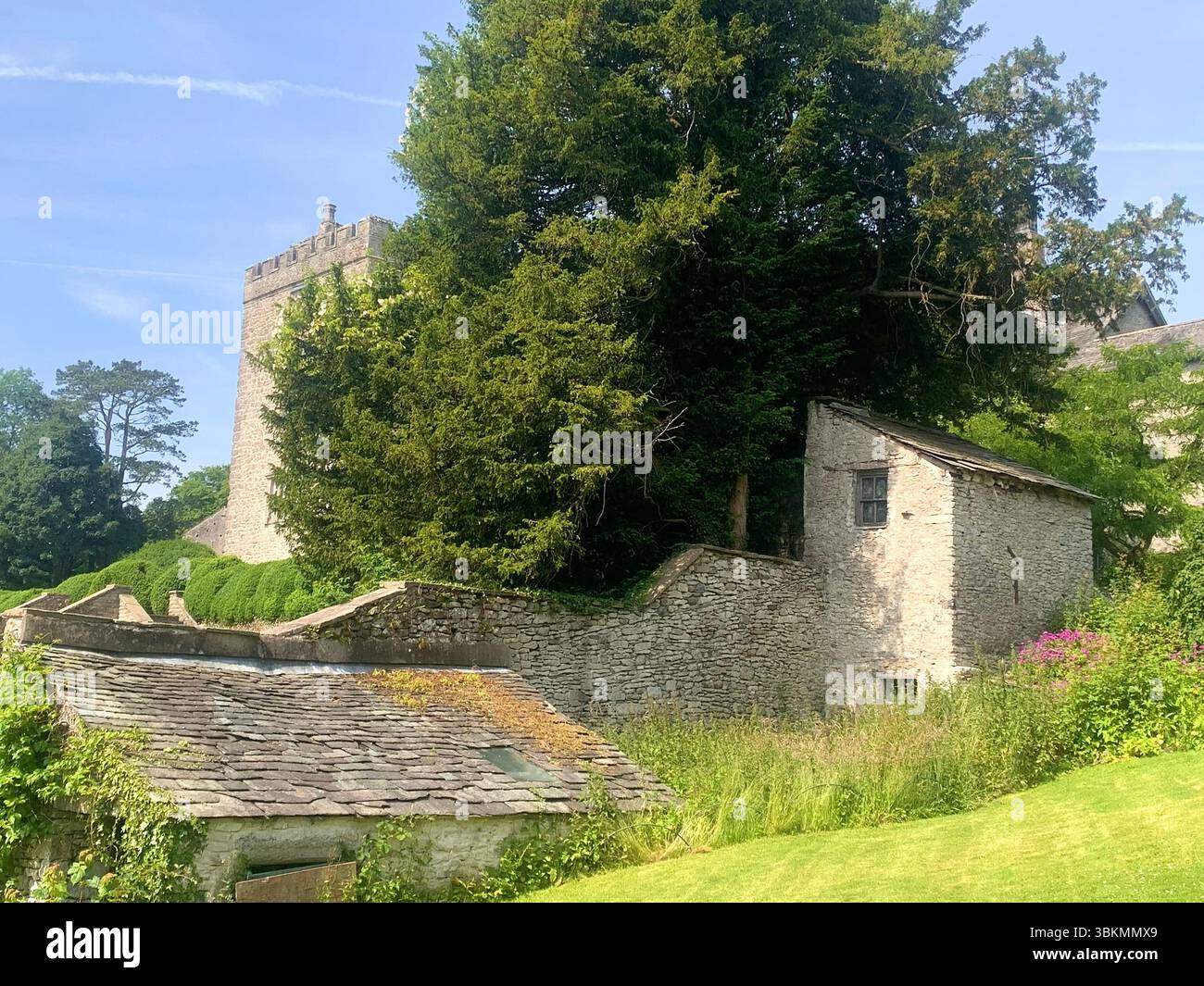 Sizergh Castle Low Sizergh barn Lake district UK Britain England sign signs National Trust property outside old history historic green place places - Smartphone Captured Stock Image