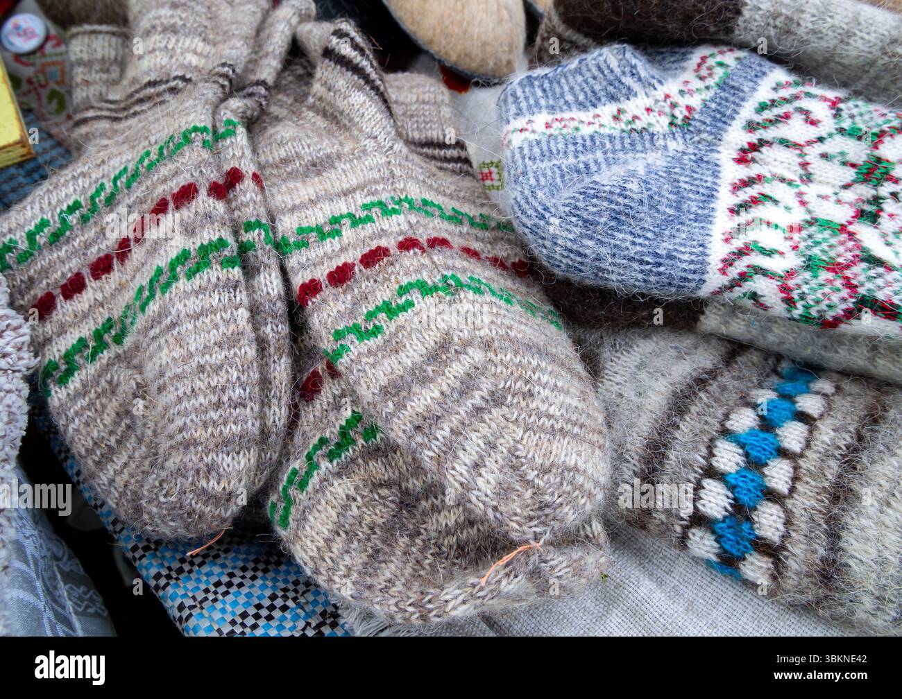 Hand knitted wool socks with ornament Stock Photo
