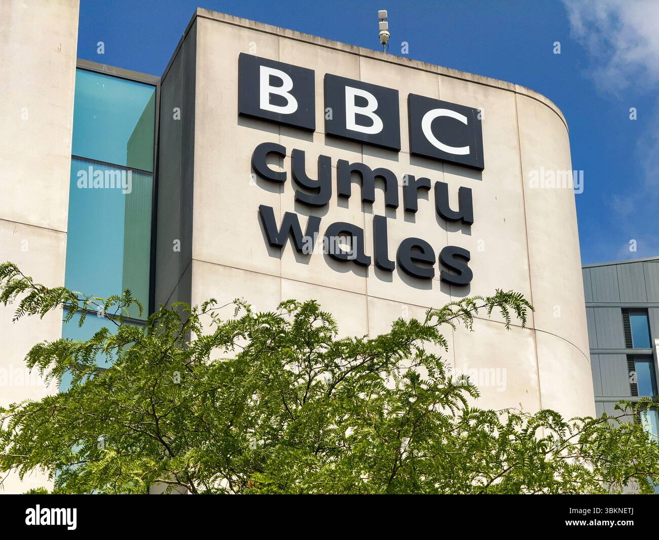 Cardiff, Wales, UK - 18 June 2025: Sign on the outside of the BBC Cymru Wales television and radio studios in the city centre - Smartphone Captured Stock Image
