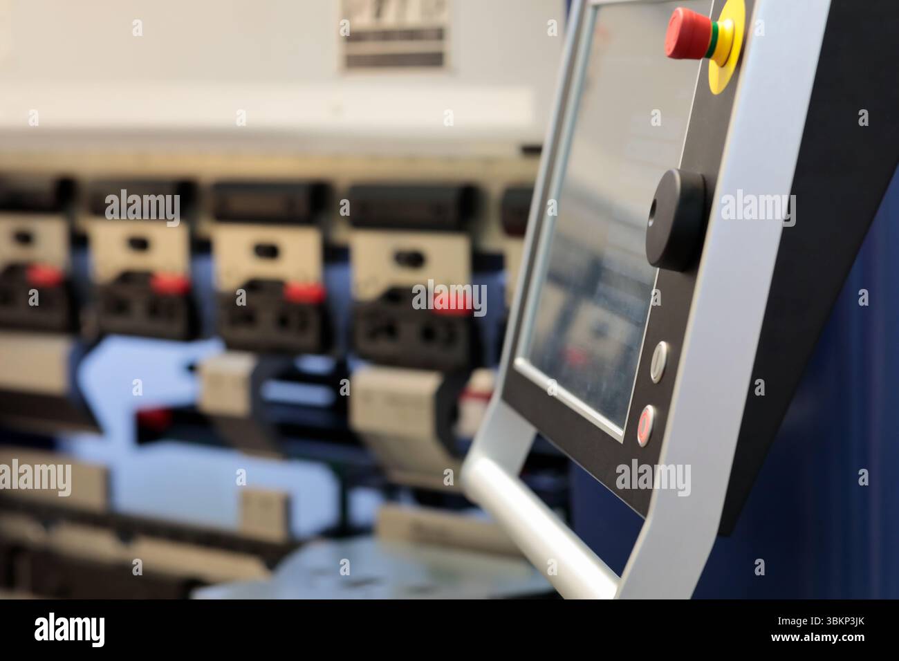 CNC sheet metal bending machine control panel close up. Touchscreen ...
