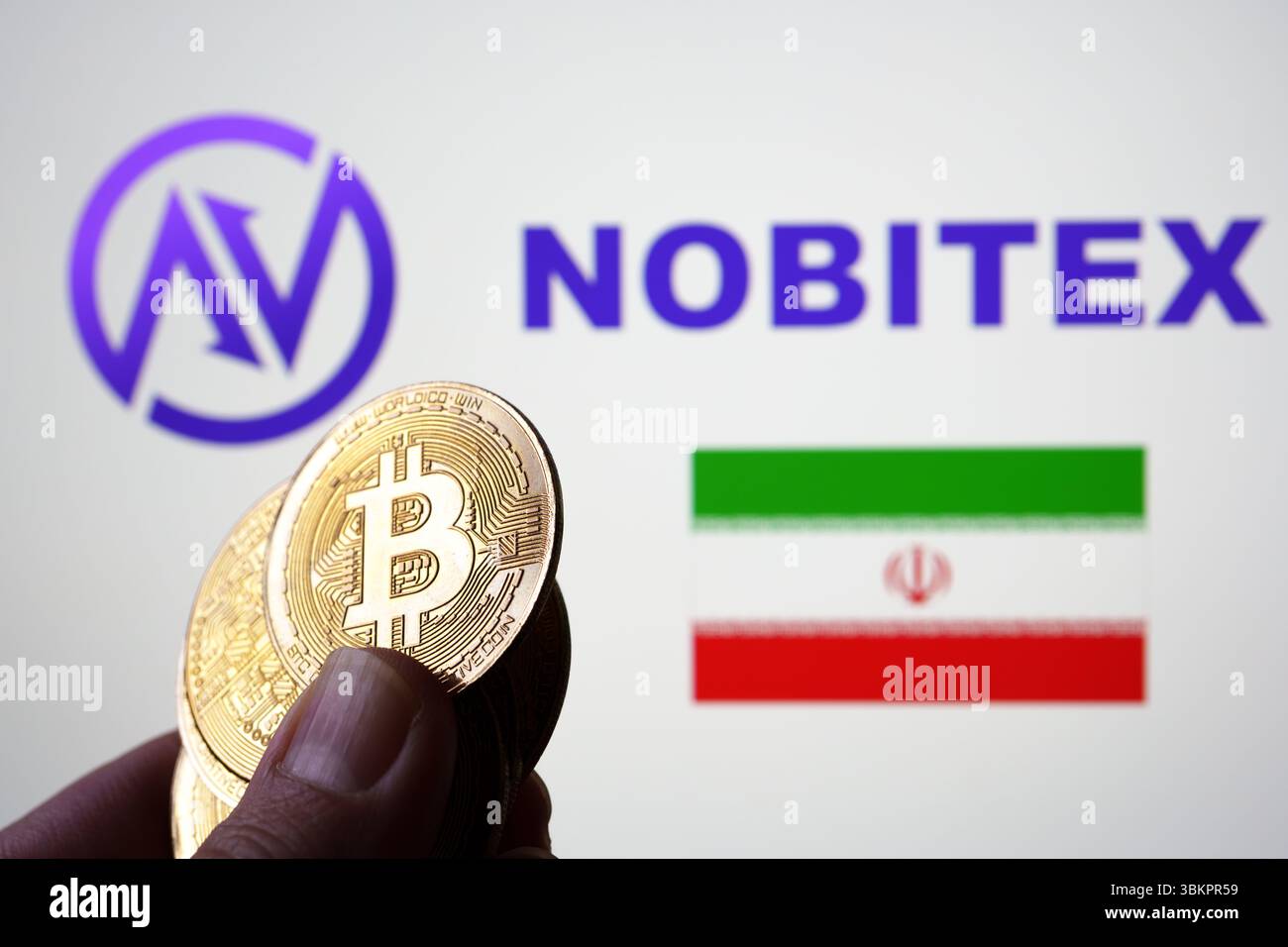 Nobitex cryptocurrency exchange logo with Iranian flag and hand holding  Bitcoin coins, concept of crypto trading in Iran. Stafford, United Kingdom,  Ju Stock Photo - Alamy