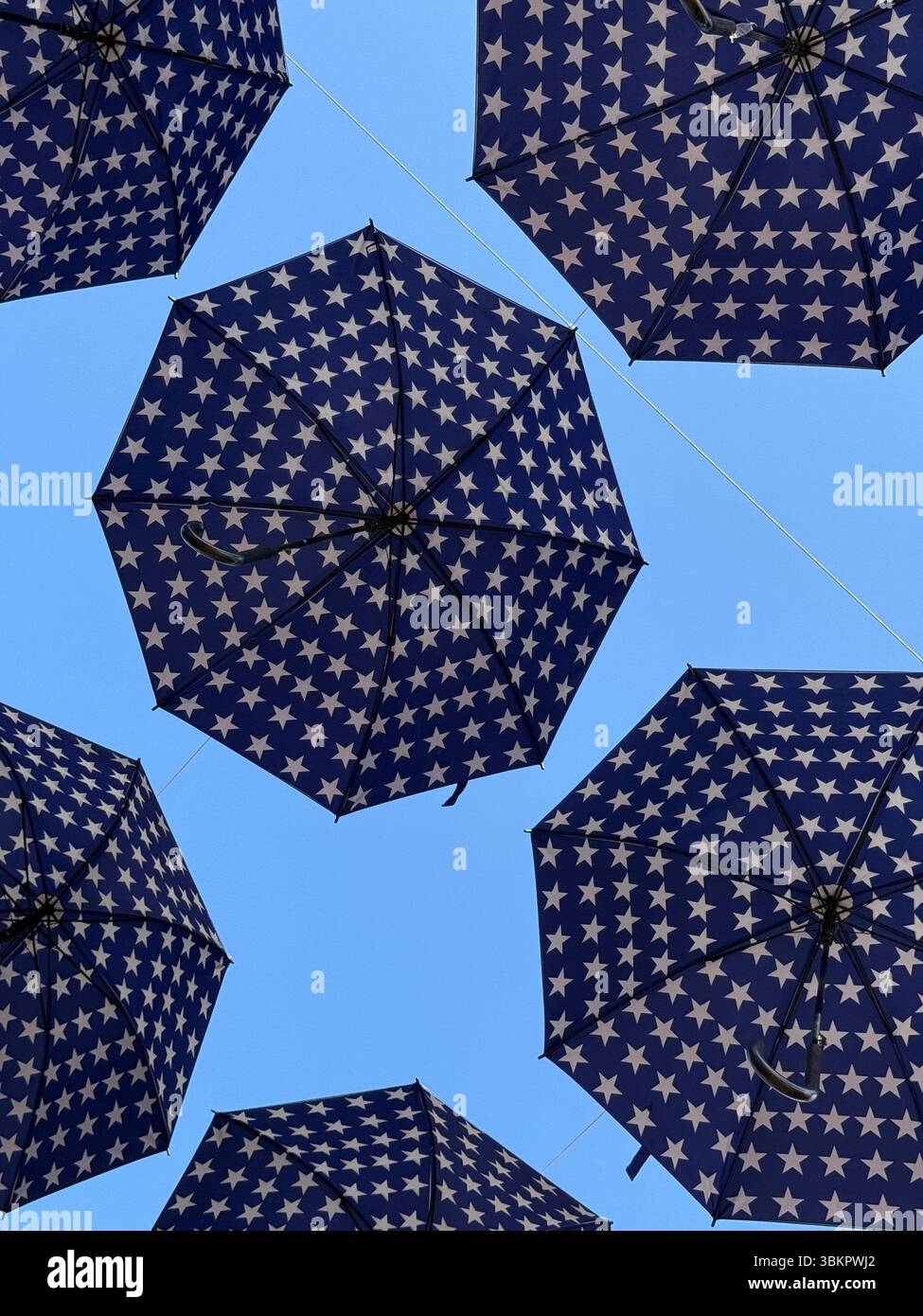 Patriotic umbrellas hanging from the sky - Smartphone Captured Stock Image
