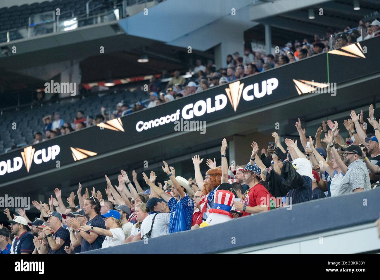 United States fans cheer during a CONCACAF Gold Cup soccer match ...