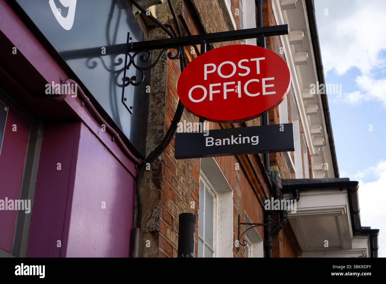 Close-up of a post office sign in Saffron Walden, England, with a ...