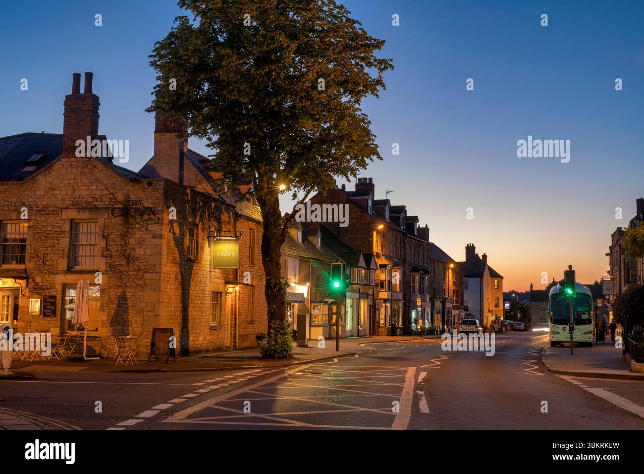 Oxford street at dusk. Woodstock, Oxfordshire, England Stock Photo