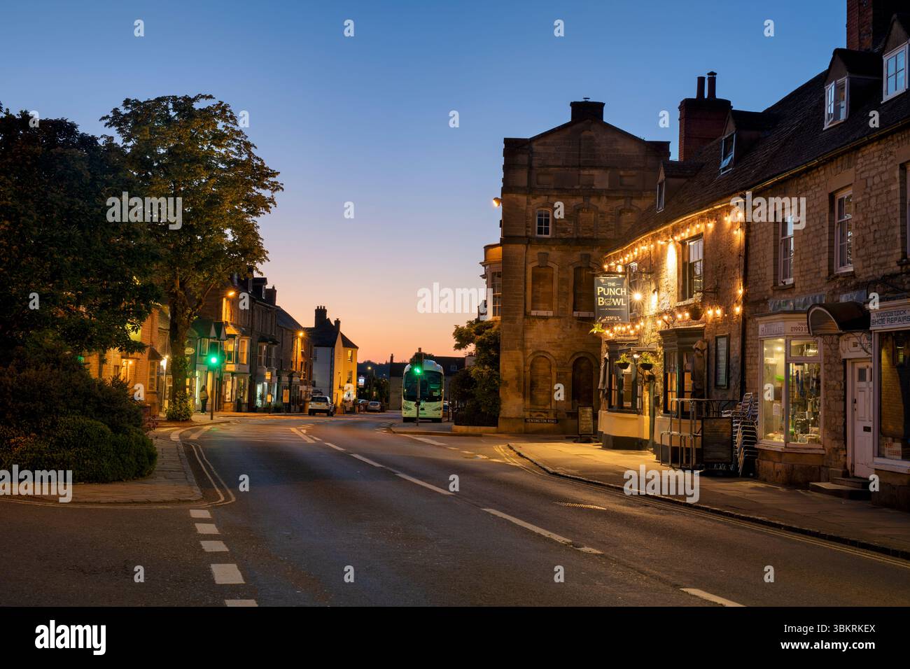Oxford street at dusk. Woodstock, Oxfordshire, England Stock Photo